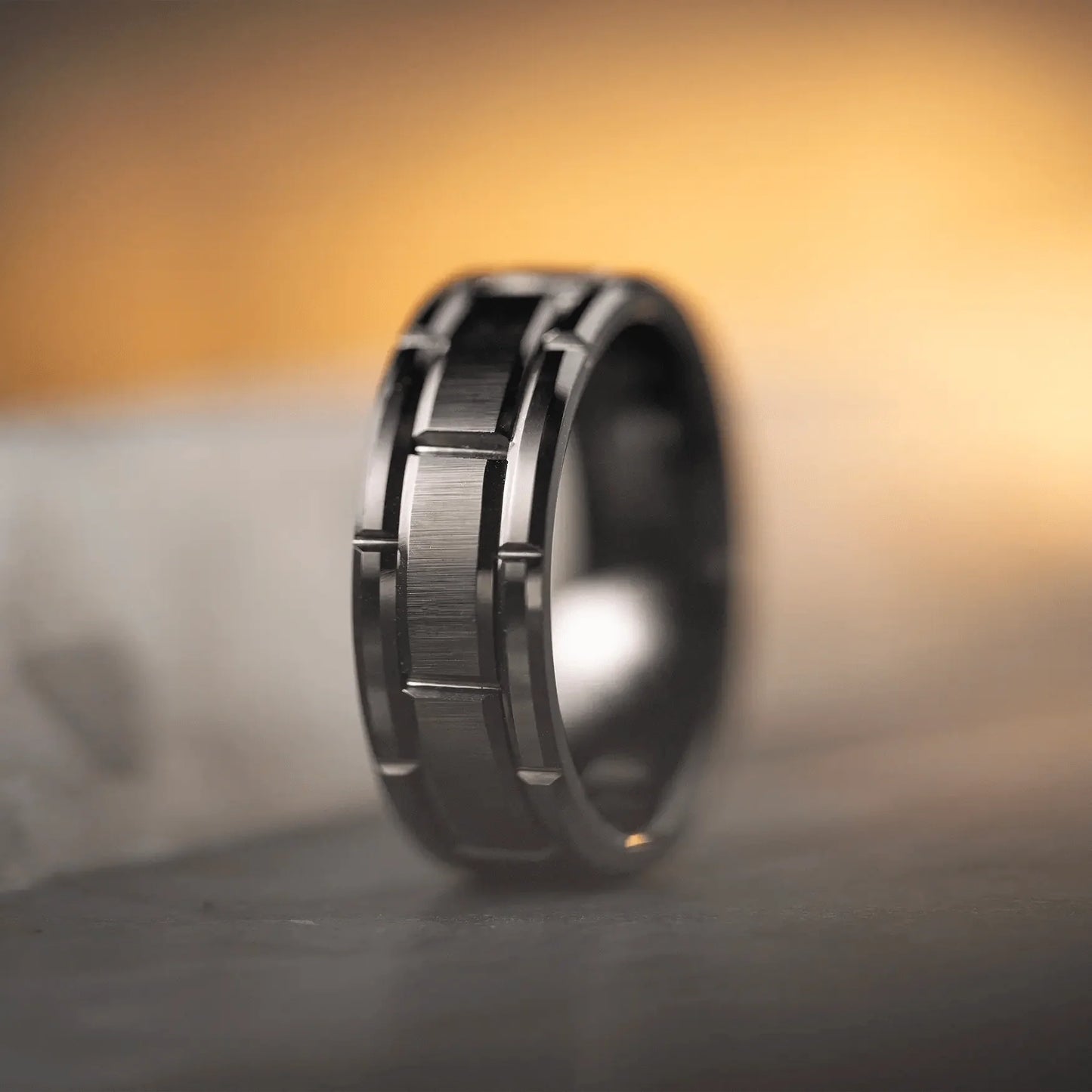 The Keep - Black-Plated Tungsten with Brick Design