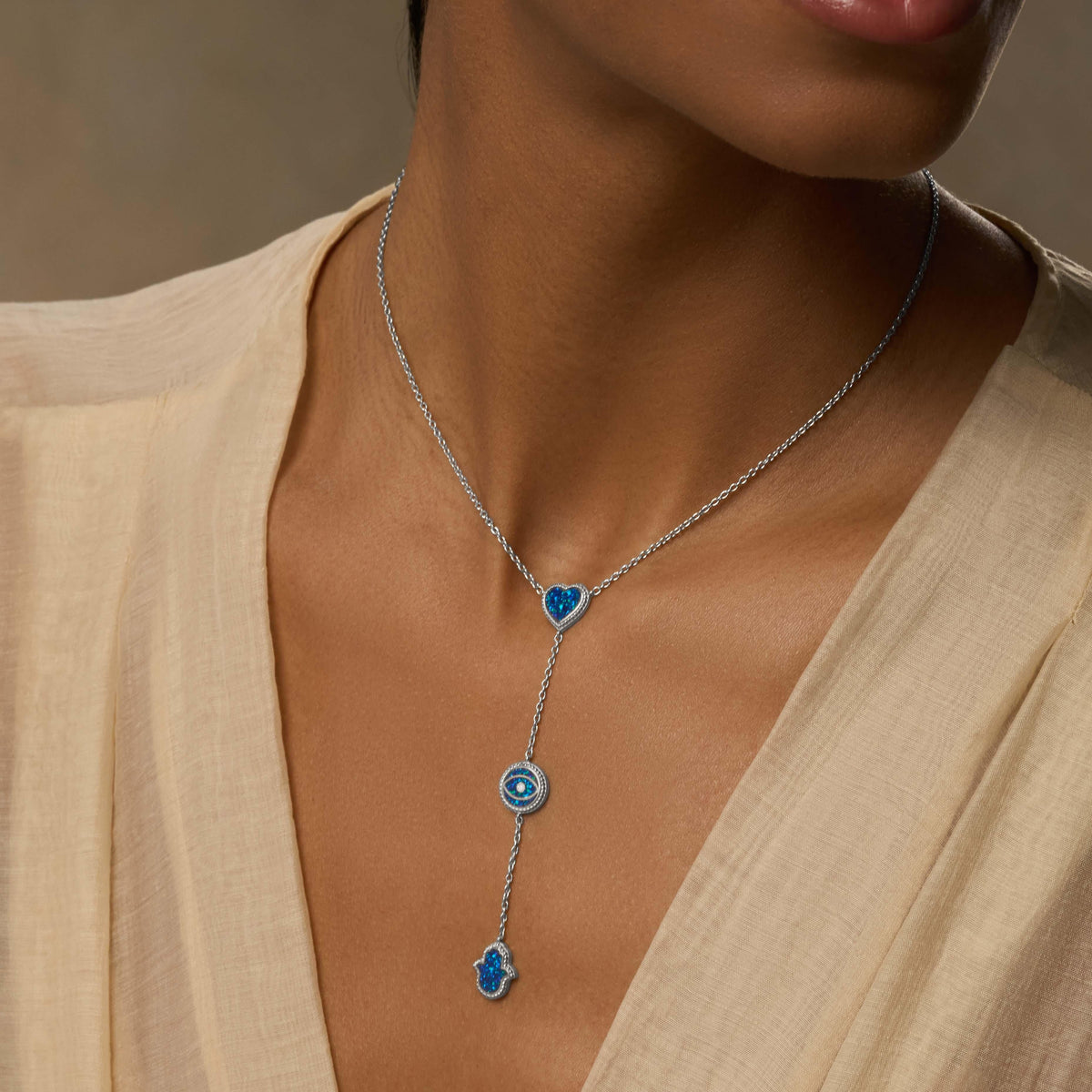 Heart’s Serenity Lab Blue Opal Multi-Symbol Silver Necklace