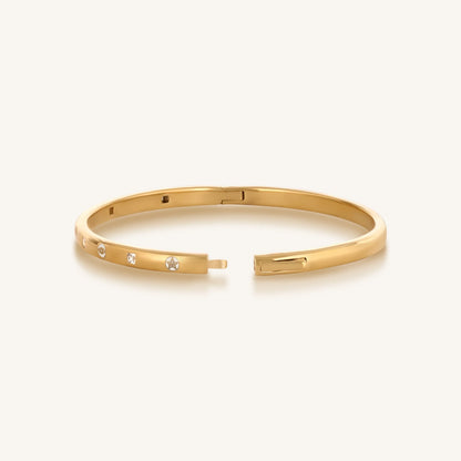 Unwavering Grace Gold Multi Symbol Bangle Bracelet