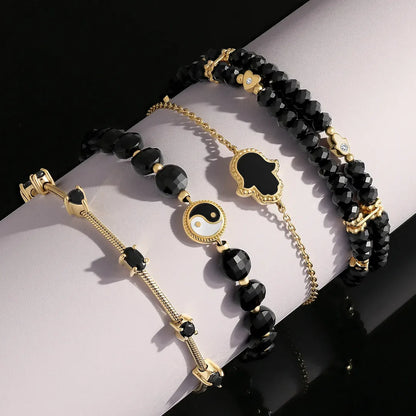 Harmony Within Multi-Charm Onyx Bracelet