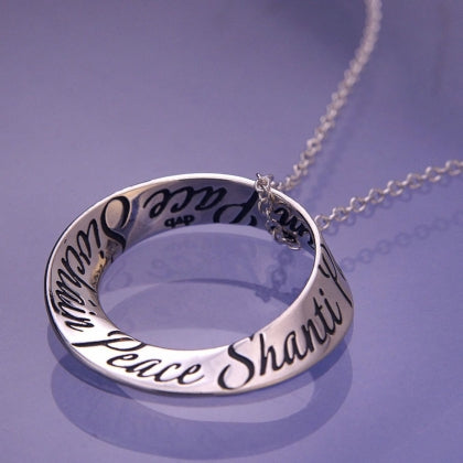 Peace in Fourteen Languages - Mobius Necklace
