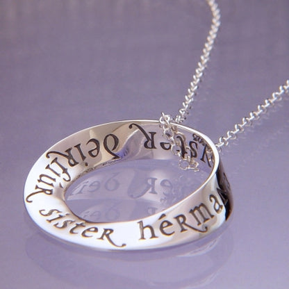 Sister in Eight Languages - Mobius Necklace